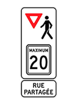 Panneau signalétique de rue partagée.