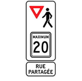 Panneau signalétique de rue partagée.